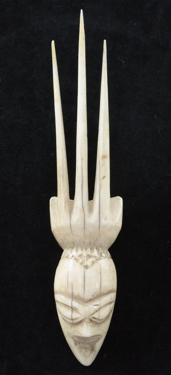 A 19th century Pende? ivory comb, 5.75in.